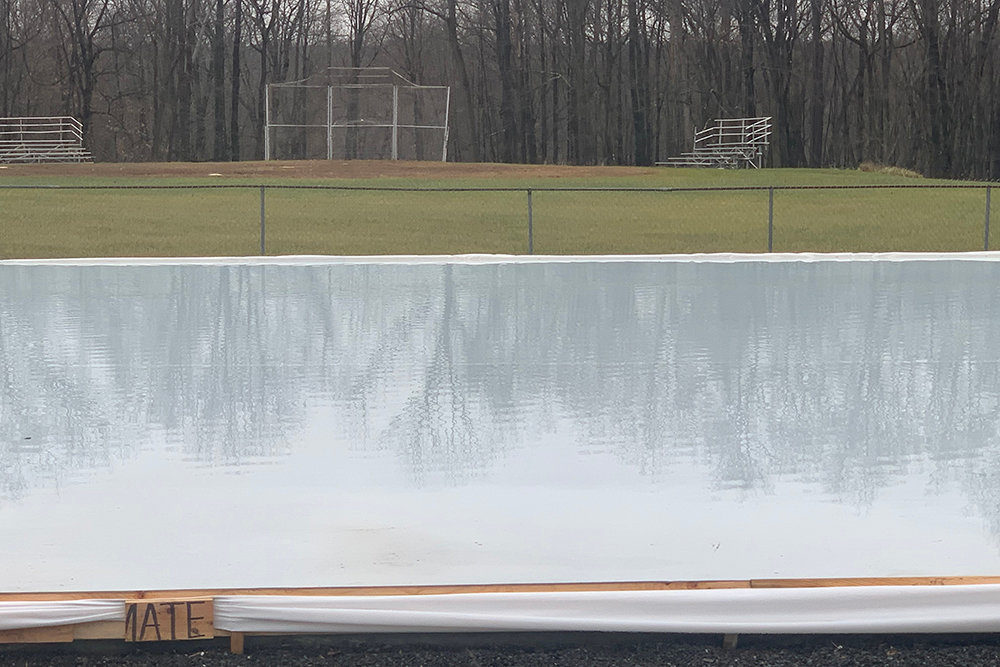 More than 10,500 gallons of water have been poured into the newly constructed rink and it will open for ice skating once it turns cold enough to form ice.